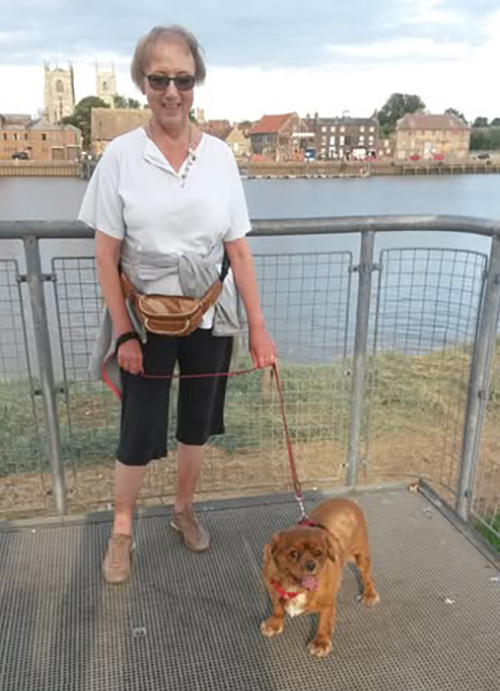 Jenefer with boarder on walk